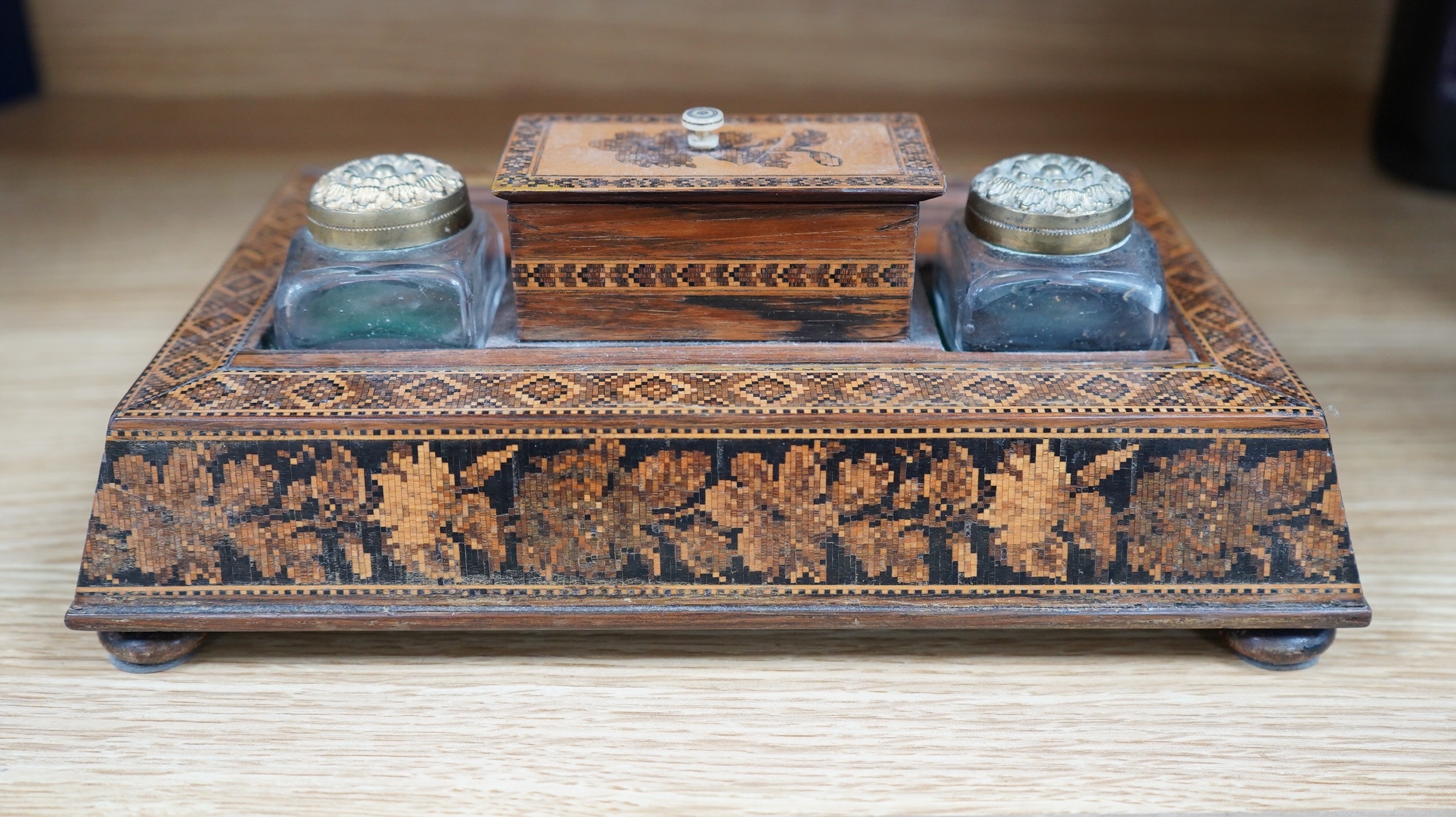 A Tunbridgeware rosewood inkstand with two glass ink bottles, 26cm wide. Condition - fair